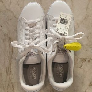 Adidas women’s size 11M new with tag, never worn